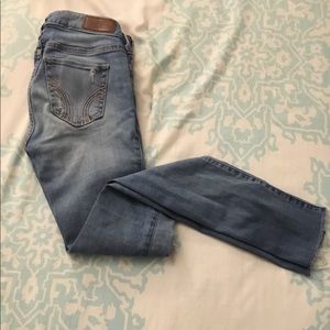 Hollister low rise jeans with a few rips .